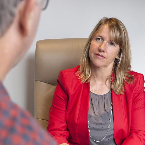 wendy hughes sitting with client